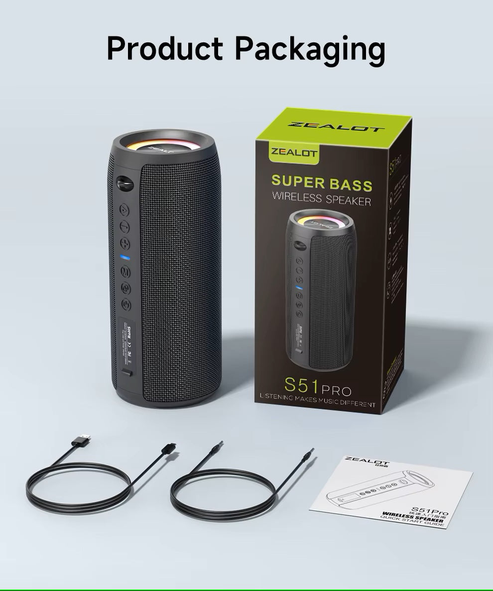 Zealot S51 Pro wireless speaker with packaging, cables, and manual on a light gray background