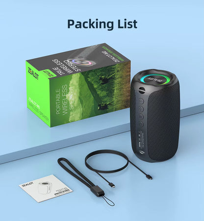 Portable wireless speaker with packaging, cable, strap, and manual on a light blue background